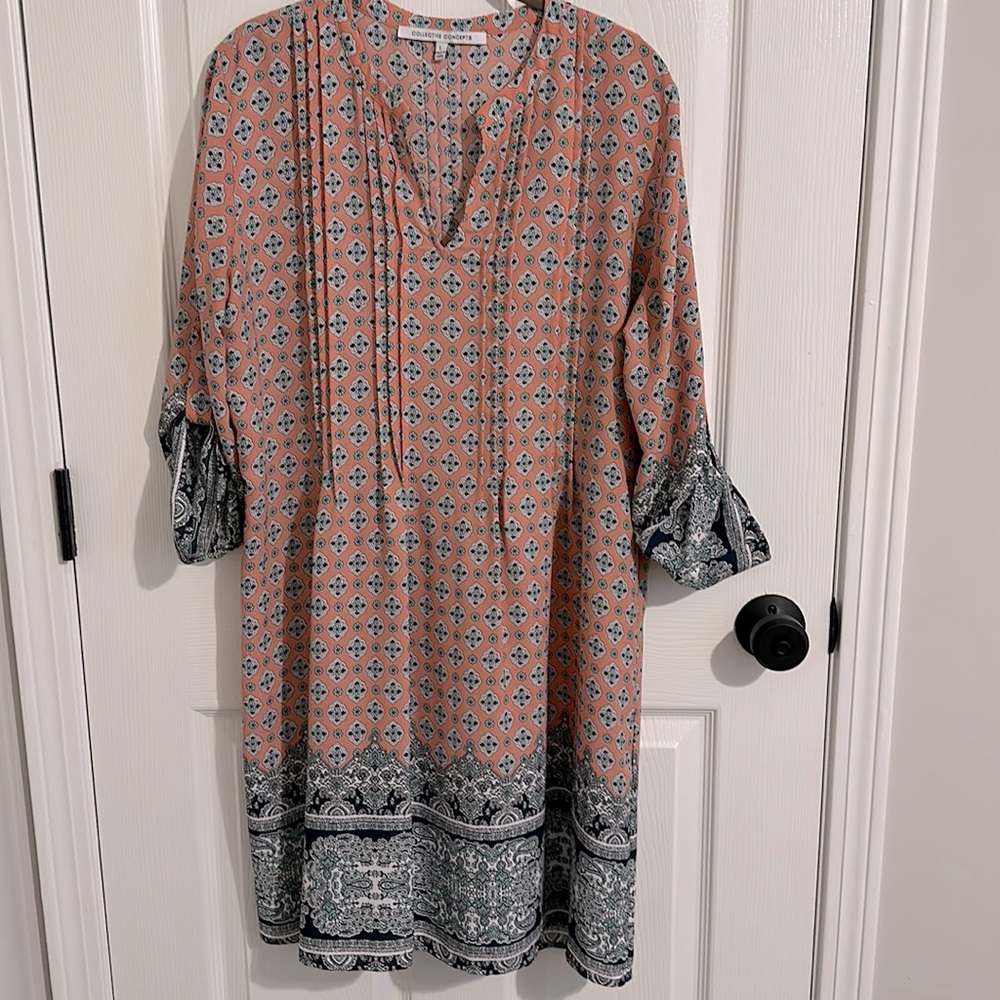 Coral, with blue and teal patterned shift dress